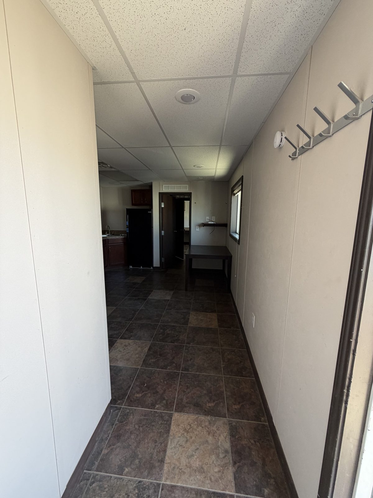 Company Man — mudroom and hallway entry